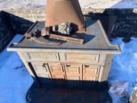 K95. Small cast iron wood stove