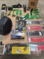 Log splitter kick off valve, Macdonald splice repair kits, John deer accessory mounting kit, John deer parts, dust mask and new welding helmet (Pallet MMMM)