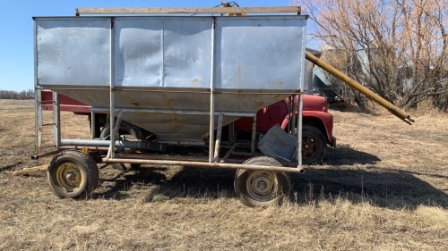 12' Gravity tank on four wheel Farm King wagon