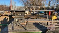K125. Rockwell/Beaver table saw with table extension and mounted router