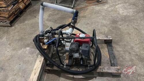 2" Honda pump with sugar hoses and filling nozzle mounted on pallet