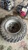 AT23x10-12 Dunlop tire on steel 4-bolt rim