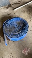 Roll of 3&rdquo; lay flat discharge hose (length unknown)