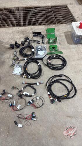 Assorted brackets and wiring for JD StarFire guidance systems