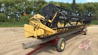 A133 25' New Holland 973 Flex Header **Clips and assorted parts in shed**