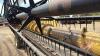 A133 25' New Holland 973 Flex Header **Clips and assorted parts in shed** - 18