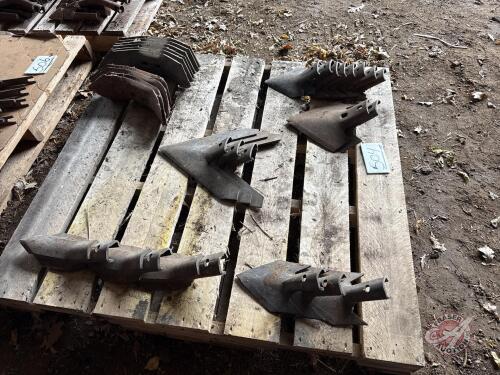 Pallet of assorted used sweeps and beaver tail shovels (sells as a pallet lot)