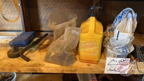 Shelf of miscellaneous farm items