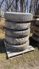 (5) 9.00 and 10.00-20 tires on rims - 2