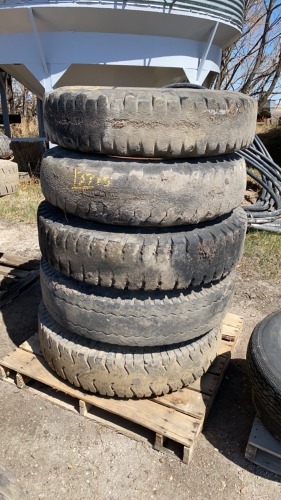 Assorted truck tires on rims