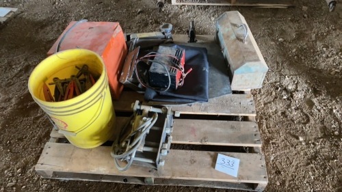 Pail of guards, construction heater, battery charger, floor jack, toolbox