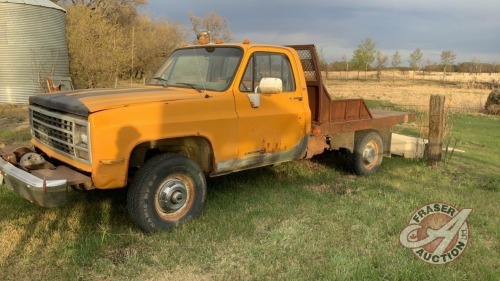 1989 Chevrolet 3500 4x4 s/a reg truck w/8ft flat deck, V8 gas, 3spd with low trans, custom front bumper with winch, 338,929showing, VIN#1GBHV34K6KF301667, Owner: D L Wilson, Seller: Fraser Auction____________