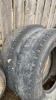 (2) 11R22.5 truck tires 1 has steel rim - 9