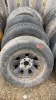 (4) P235/75R 15 tires on steel rims - 5