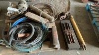 Rail iron, cable, assorted tubing, Hydraulic cylinder, Top and die parts