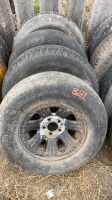 (4) P235/75R 15 tires on steel rims