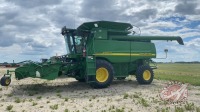 JD 9760 STS combine w/JD 914P header, 2394 threshing & 3335 engine hours showing, s/nS706478