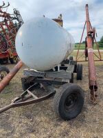 500-gal propane tank on 4-wheel farm wagon, freshly paintedA32