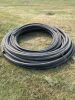 2 coils of NEW poly water pipe, 1 coil is approx 300' & 1 1/2" is approx 100' , A52