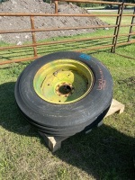 used 11.25-24 tire on JD rim, A37