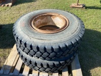 used 10.00R20 tire on rim - 80% tube type  A53