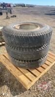 (2) 10.00-20 tires on rims and (1) 10.00-20 tire no rim (used)