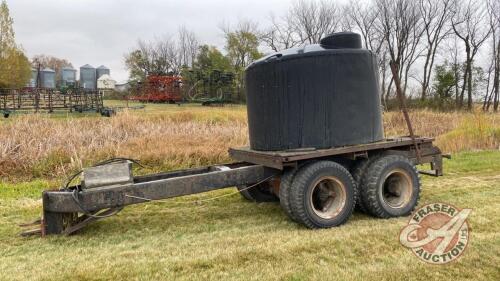 1250-gal black poly tank on tandem wagon