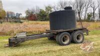 1250-gal black poly tank on tandem wagon