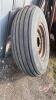 Used 9.5L-15 tire on 6-bolt rim - 2