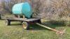 1000-gal poly tank on 12-ton Farm King 4-wheel wagon - 3