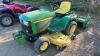 JD 425 Lawn Tractor with 48in JD 450 3pt roto tiller, 987hrs showing, 20hp V-Twin engine, H163 ***keys - office trailer*** ***PTO - office shed***