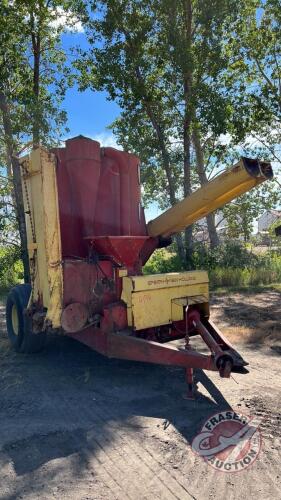 1979 NH 359 Mix Mill with power bale feed, hyd unload auger, 4 screens, 1 new turn on hammers, mineral by pass hopper, unload auger flighting needs repair, 16.5L-16.1 rubber, 1000 PTO, s/n 488174