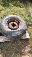7.60 - 15 Imp tire with rim (cracked), J92