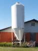 Approx 7 Ton hopper bottom feed bin, (Pick up in Belmont, Mb call Brain Trottier for details 204-523-6683) J63