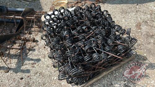 Pallet of used harrow tines