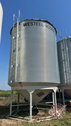 Bin #9, Approx 2100 Bushel Westeel Roscoe on Peloquin hopper cone, s/n FAN 252588, (This bin still has grain in it and will not be ready for removal until June 15th 2023)