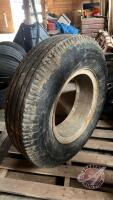 Used Goodyear 9.00-20 tire on rim