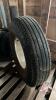 Used Goodyear 9.00-20 tire on rim - 2