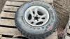 Used 31x10.50R15LT with aluminum rim,F64