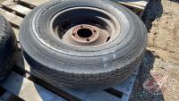 Used 8.25-14 Tire with 4 bolt auger rim, F120