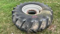 Used Firestone 23.1-30 tire on 12-bolt MF combine rim